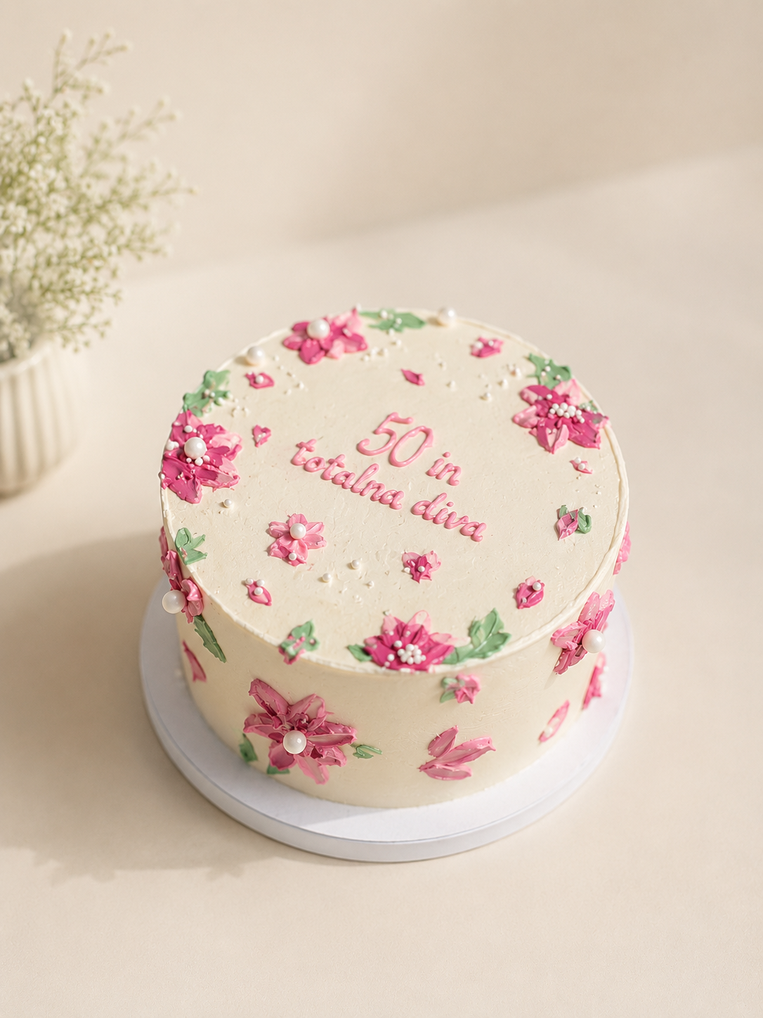 Torta z rožnatim cvetličnim okrasjem